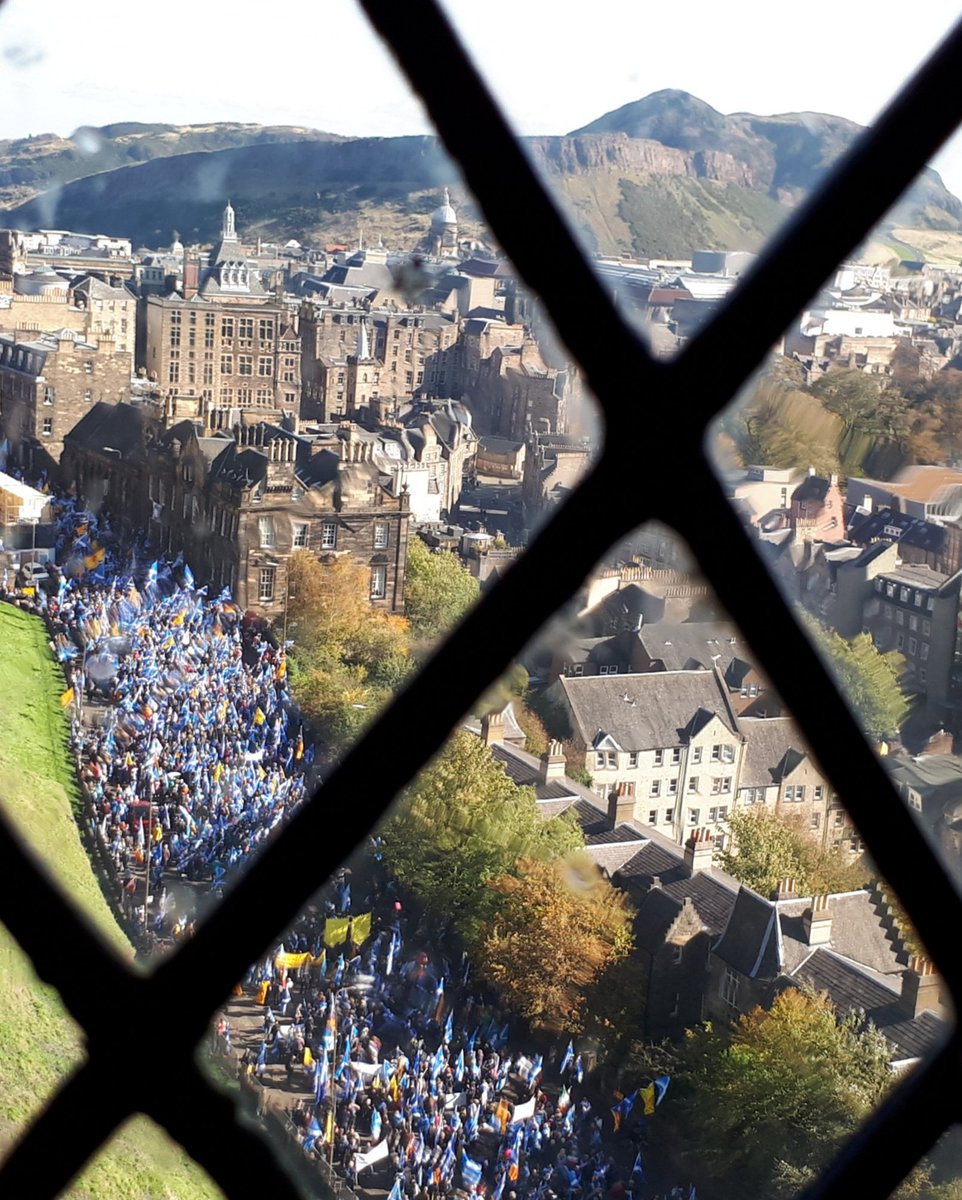 Scottish independence march in Edinburgh today, as viewed from inside the castle.
