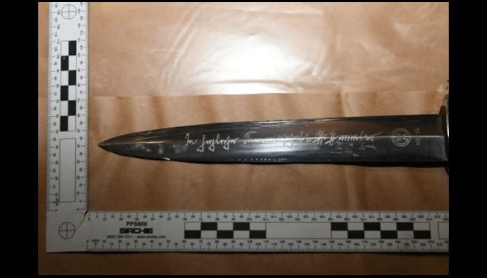 Police have released an image of a knife used during a robbery in Thatcham. A man entered a betting shop carrying the weapon. 