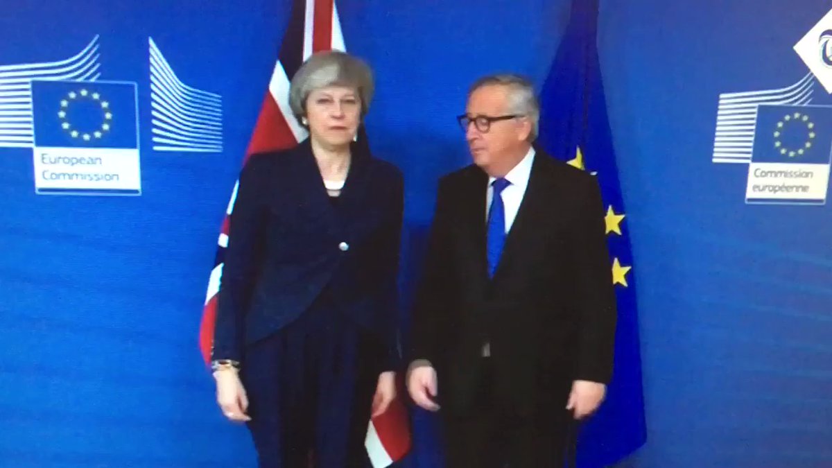 Theresa May's spectacular handshake with Jean-Claude Juncker. 