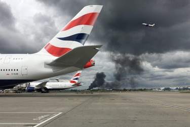 Massive blaze breaks out near Heathrow Airport as locals report several explosions at storage yard. 