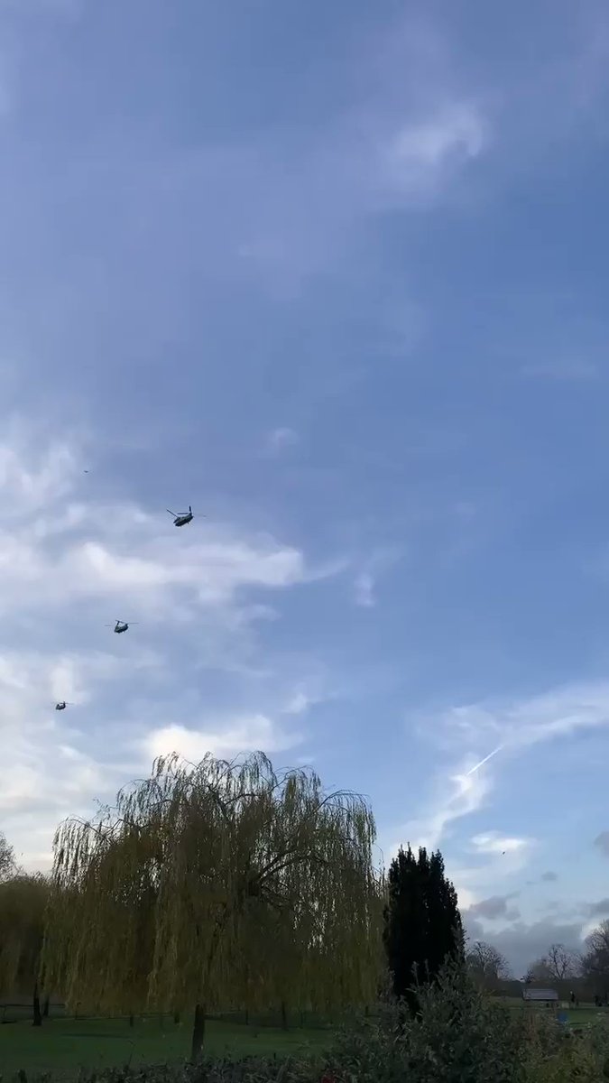Helicopters flying in Hampstead Heath, greater London