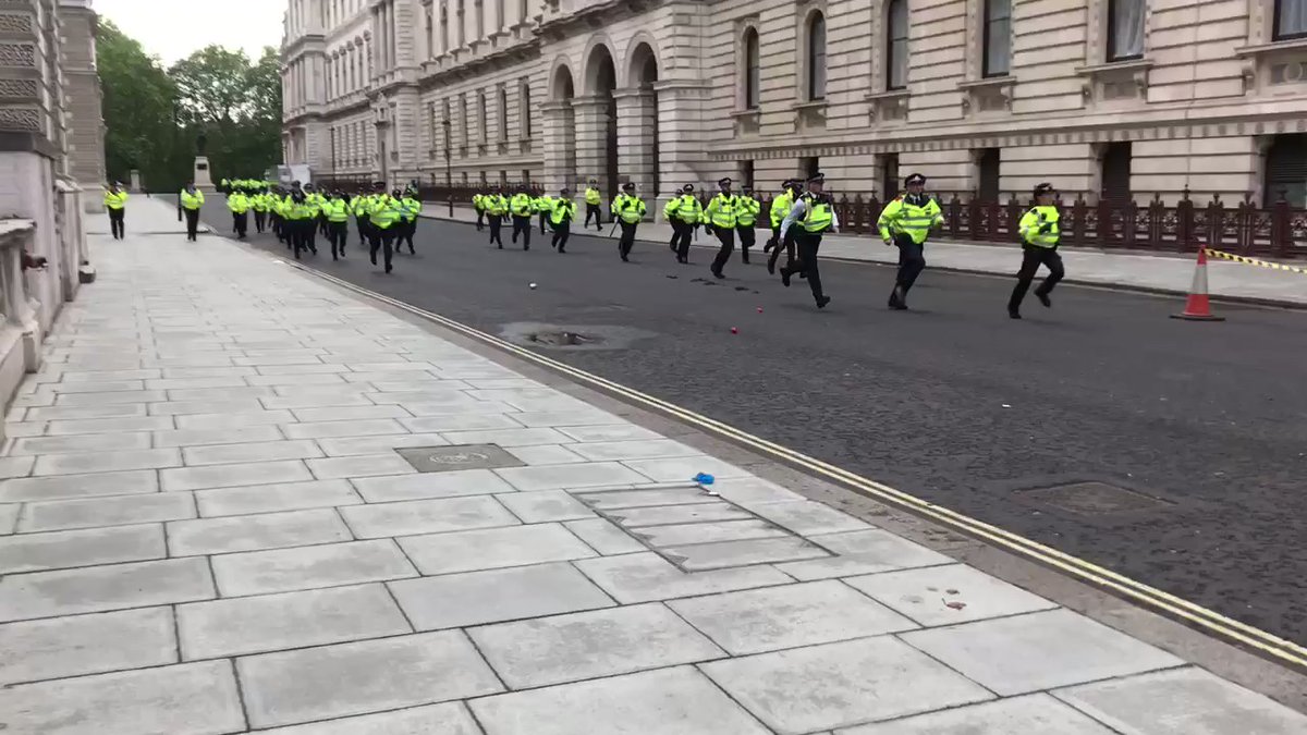 Reinforcement arrives as injured officer walks away from scene