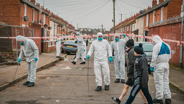 Police have said that west Belfast murder victim Mark Hall's sister is lucky to be alive today after the gunmen that killed her brother narrowly missed her with a gunshot as they ran off