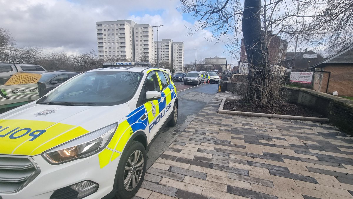 Something happening at Cambuslang train station. A train is stopped and a number of police are in attendance